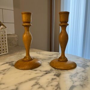 Antique wooden candle stick holders.